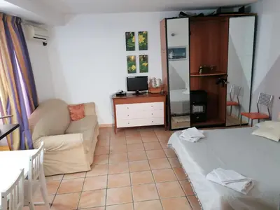 Letto o letti in una camera di Monolocale Cappuccini