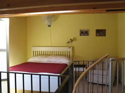 Letto o letti in una camera di Pozzo Luce