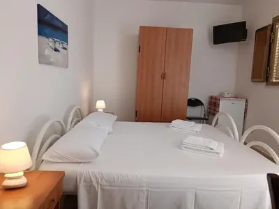 Letto o letti in una camera di Casa Il Pesco