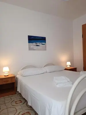 Letto o letti in una camera di Casa Il Pesco
