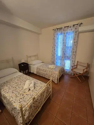 Letto o letti in una camera di casaCettina