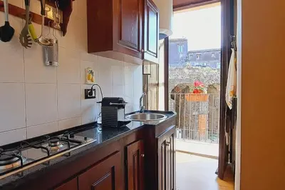 Cucina o angolo cottura di OdeonHouse - Catania - Parking Included