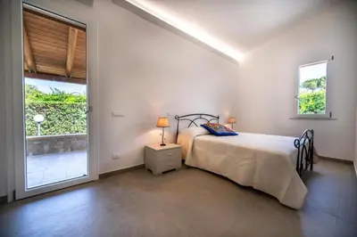 Letto o letti in una camera di Villa del Cavaliere
