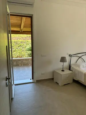 Letto o letti in una camera di Villa del Cavaliere