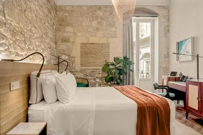 Letto o letti in una camera di COOL DREAMS Luxury Rooms