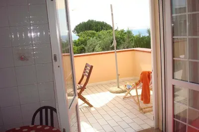 Balcone o terrazza di VILLA CALA BERNARDO 2 Appartamenti