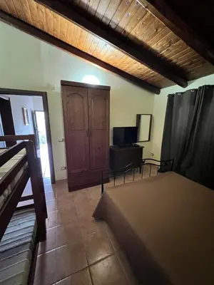 Letto o letti in una camera di Villa Ludovica Siracusa, Pool 6x12, Jacuzzi, Padel, Pickleball, Volleyball, Wifi