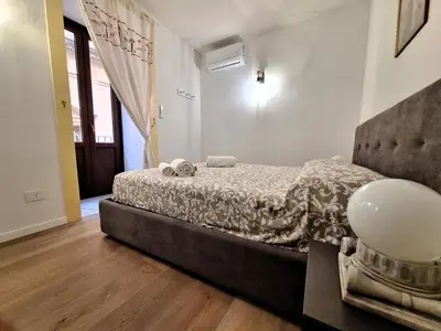 Letto o letti in una camera di Artemis Moon - Ortigia Lovely Apt