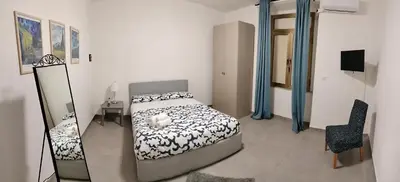 Letto o letti in una camera di La casa di Aga