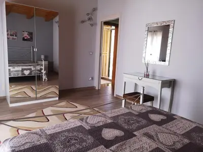 Letto o letti in una camera di Vacanze Patty
