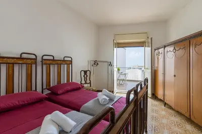 Letto o letti in una camera di Casa Iblea