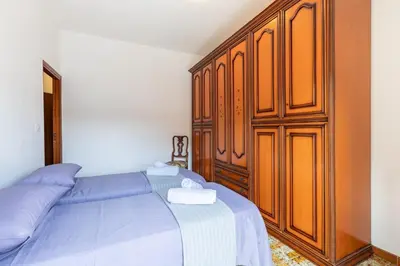 Letto o letti in una camera di Casa Iblea