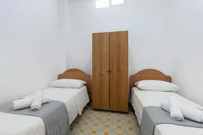 Letto o letti in una camera di Casa Iblea