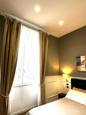 Letto o letti in una camera di Naiadi Rooms