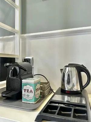 Set per la preparazione di tè e caffè presso Naiadi Rooms