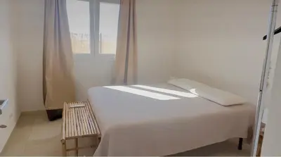 Letto o letti in una camera di Casa MYA zona oasi