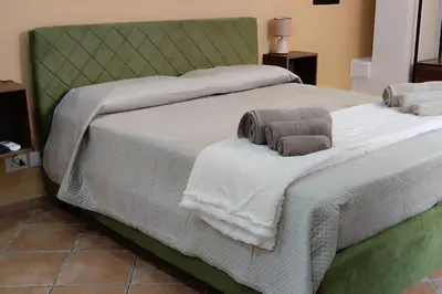 Letto o letti in una camera di Casa Giolù