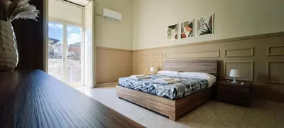 Letto o letti in una camera di Nopaquie