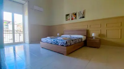 Letto o letti in una camera di Nopaquie