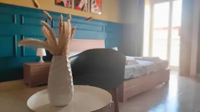 Letto o letti in una camera di Nopaquie