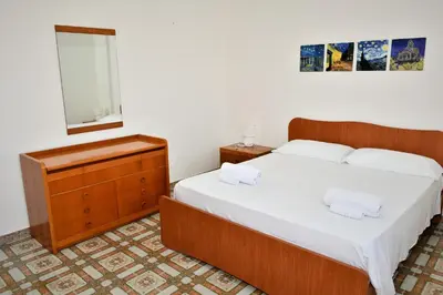 Letto o letti in una camera di Villa Santa Maria del Focallo Maisonette