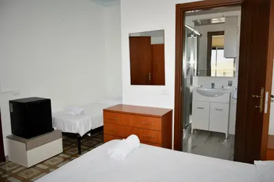 Letto o letti in una camera di Villa Santa Maria del Focallo Maisonette