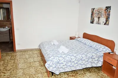 Letto o letti in una camera di Suite Santa Maria