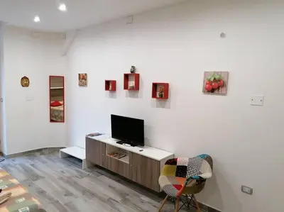TV o dispositivi per l'intrattenimento presso Carla Home - few steps to Ortigia
