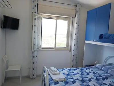 Letto o letti in una camera di Villa Cavarra
