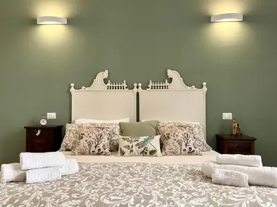 Letto o letti in una camera di Le sorelle sweet home