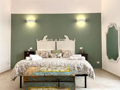 Letto o letti in una camera di Le sorelle sweet home