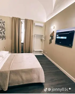 Letto o letti in una camera di DeLucaHome