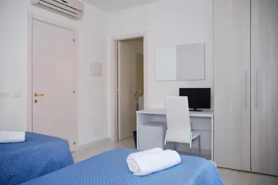 Letto o letti in una camera di B&B Sikelia