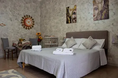 Letto o letti in una camera di La Maison Sicula