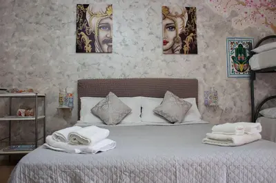 Letto o letti in una camera di La Maison Sicula