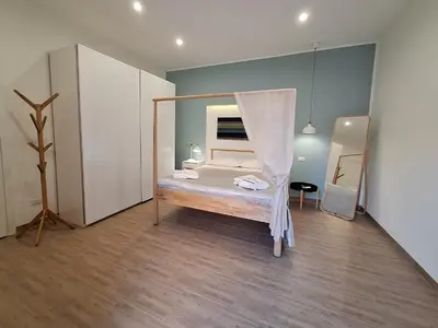 Letto o letti in una camera di Dimora Luciano