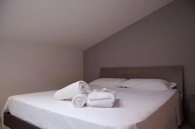 Letto o letti in una camera di Dolcevita Marzamemi
