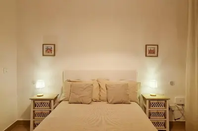 Letto o letti in una camera di ELIOS Apartment