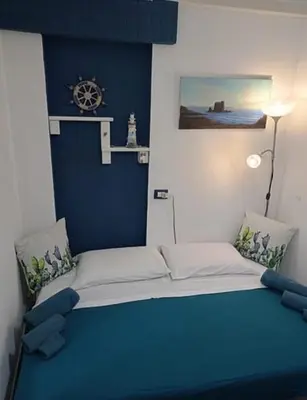 Letto o letti in una camera di VILLA ROSY LIDO di NOTO