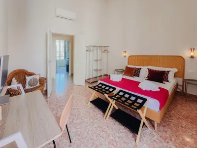 Letto o letti in una camera di Iconic Ortigia Residence - CarAccess PrimeLocation DiningGuide