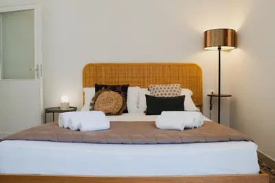 Letto o letti in una camera di Iconic Ortigia Residence - CarAccess PrimeLocation DiningGuide