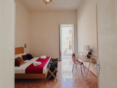 Letto o letti in una camera di Iconic Ortigia Residence - CarAccess PrimeLocation DiningGuide