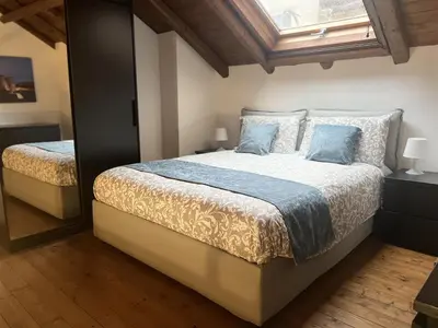 Letto o letti in una camera di Catania Loft Gentile elegante loft nel centro storico di Catania Castello Ursino