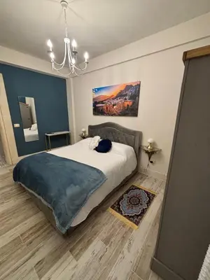 Letto o letti in una camera di B&B Villa Brikinnia