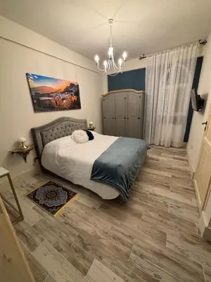 Letto o letti in una camera di B&B Villa Brikinnia