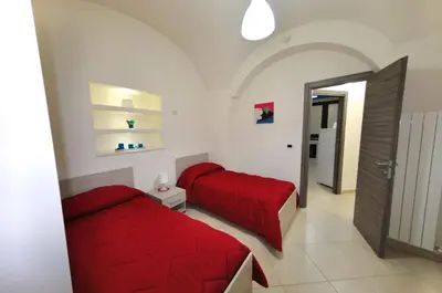 Letto o letti in una camera di Apartments Casa Vacanze Dante