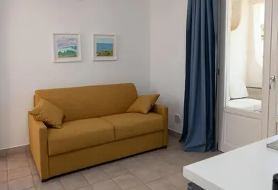 Area soggiorno di Casa da sogno a due passi da spiaggia bandiera blu