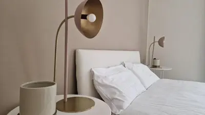 Letto o letti in una camera di Sisma Home