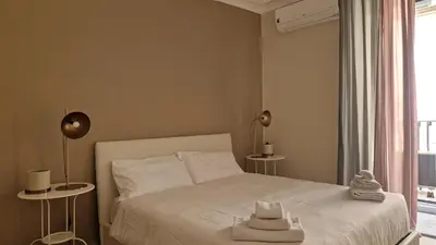 Letto o letti in una camera di Sisma Home