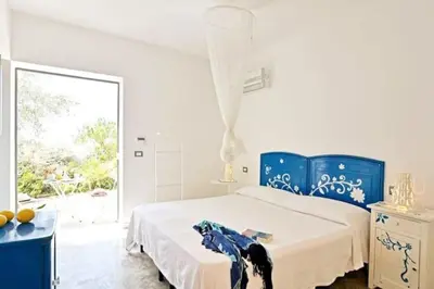 Letto o letti in una camera di Villa Siciliana con vista mare spettacolare vicino centro di Noto comoda ai servizi